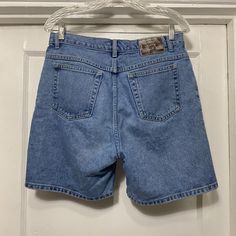 Vintage 90s/Y2k St Johns Bay Relaxed Fit Denim Shorts Tag says size 10.  Made in Nicaragua.  100% cotton.  In good shape no rips or stains that I can find.  The waist measures 16'' flat across and the length from waist to bottom along the side is 18''.  The inseam is 7'' and the rise is 12''. Y2k High Rise Cotton Shorts, Y2k Cutoff Jean Shorts With Pockets, Y2k Style Cutoff Jean Shorts With Pockets, Y2k Style Cutoff Cotton Jeans, Y2k Cotton Cutoff Jeans, Y2k Cotton Jean Shorts With Pockets, Y2k Style Cotton Cutoff Jeans, Y2k Mid-rise Cotton Shorts, Y2k Style Mid-rise Cotton Shorts