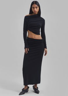 Color: Black Midweight woven stretch fabric Regular fit Maxi length Asymmetrical twisted waist detailing Slip on style Unlined 76% Polyester 19% Rayon 5% Elastane Dry Clean By The Frankie Shop. Imported Asymmetric Skirt, The Frankie Shop, Frankie Shop, Asymmetrical Skirt, Asymmetrical Tops, Stretch Fabric, Off The Shoulder, Dry Clean, Slip On