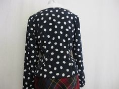 "Liz Claiborne Peplum Blouse ~Sassy~ Polka Dot Blouse ~This is a WOW~ Beautifully tailored and fitted Poly crepe A bit dress up! Button front Peplum waist Shoulder pads have been removed Small 4 Petite Bust 38\" Waist 30\" Hip 40\" Shoulder 16\" Length 19\" Excellent condition Looks unworn! https://www.etsy.com/shop/BelindasStyleShop" Retro Fitted Polka Dot Blouse, Vintage Polka Dot Blouse For Work, Vintage Polka Dot Blouse For Workwear, Classic Fitted Polka Dot Blouse, Fitted Polka Dot Blouse For Work, Fitted Retro Workwear Blouse, Vintage Tailored Polka Dot Blouse, Fitted Vintage Polka Dot Blouse, Fitted Long Sleeve Polka Dot Blouse