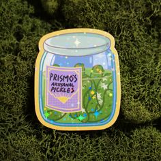 a sticker with the words primos international pickles on it sitting in some grass