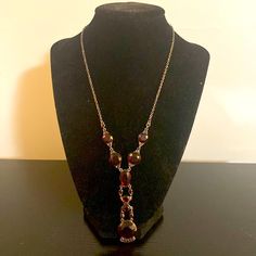 Bronze Chain With Dark Red Stones, Approximately 16 Inches, With Matching Drop Earrings. Never Worn Elegant Red Chain Jewelry, Evening Red Metal Jewelry, Adjustable Burgundy Jewelry For Party, Elegant Red Jewelry With Chain Detail, Red Metal Evening Jewelry, Red Vintage Wire Wrapped Jewelry, Vintage Red Wire Wrapped Jewelry, Red Wire Wrapped Vintage Jewelry, Formal Red Faceted Necklace