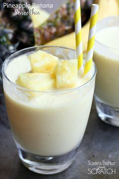 two glasses filled with pineapple banana smoothie