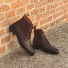 Custom Made Women's Military Brogue Boot in Burgundy and Dark Brown Painted Calf Leather Make them Uniquely Yours! Change the colors, change the material, or simply change the laces! Click below to customize these Women's Military Brogue Boots! [su_button url="https://augustapparel.com/custom-made/#/?b=P289NjA4X19hZjQ2M2JmMi1lNWI3LTQ3YTQtYTM4MS1lMWVjNjExODYwYWQ=" background="#e55417"  color="#000000" center= "yes" size="8"]Customize T Classic Brogue Lace-up Boots For Derby, Fall Gala Wingtip Dress Shoes, Leather Shoes With Brogue Detailing For Fall Galas, Classic Chukka Boots With Brogue Detailing And Cap Toe, Elegant Chukka Boots With Wingtip And Rubber Sole, Semi-formal Wingtip Chukka Boots With Rubber Sole, Elegant Goodyear Welted Wingtip Chukka Boots, Workwear Cap Toe Boots With Brogue Detailing, Workwear Brogue Cap Toe Boots