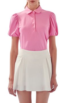 Puff sleeves perfectly frame this preppy top cut from cotton jersey and styled with a Peter Pan collar with matching piping. Peter Pan collar Short sleeves 65% cotton, 26% polyester, 9% spandex Hand wash, dry flat Imported Preppy Tops, English Factory, Cute Blouses, Blouse Outfit, Pan Collar, Jersey Top, Peter Pan Collar, Short Sleeve Blouse, Peter Pan