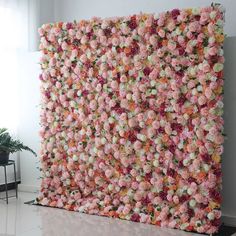 a large flowered wall in the corner of a room