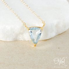 "Blue Aquamarine Triangle Necklace - Choose Your Aquamarine - March Birthstone Necklace - - - - - - - - - - - - - - - - - - - - - - - - - - - - - - - - - - - - - - - - - - - - - - - - - - - - - - - - - - - - Choose your favourite pendant from options A - E as shown in images. Stone: Natural AAA Grade Blue Aquamarine Pendant, Triangle Cut A - Pendant in main image - 8.50x11x7mm - 3.09ct B - 9.50x11x5mm - 2.985ct C - 9.25x13.50x6mm - 3.92ct D - 9x11.50x5mm - 2.785ct - 3D pyramid shape (centre of s Elegant Aquamarine Gemstone Necklace, Luxury Aquamarine Pendant Necklace, Elegant Blue Faceted Necklaces, Elegant Blue Faceted Necklace, Formal Blue Faceted Necklaces, Formal Blue Faceted Necklace, Luxury Aquamarine Necklace For Anniversary, Formal Aquamarine Gemstone Necklace, Formal Yellow Gold Aquamarine Necklace