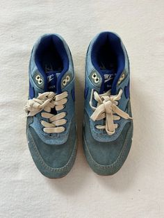 worn a few times. Denim Blue Lace-up Sneakers For Streetwear, Urban Blue Denim Sneakers, Denim Blue Urban Sneakers For Streetwear, Urban Denim Blue Sneakers For Streetwear, Sporty Denim Blue Lace-up Sneakers, Blue Urban Custom Sneakers With Laces, Urban Blue Custom Sneakers With Laces, Denim Blue Sneakers With Rubber Sole, Nike Blue Sneakers With Gum Sole