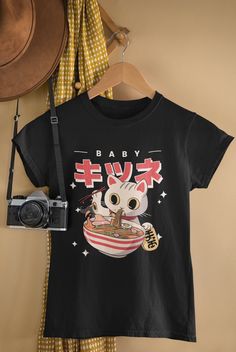 Add some fun to your wardrobe with this Japanese Ramen Art T-shirt or give it as the perfect gift! Check Our Other Gifts For Japanese Art Lovers Here 👉 https://www.etsy.com/shop/softandme/?section_id=36126980 Check Our Other Gifts For Women's Right Fighter Here 👉 https://www.etsy.com/shop/softandme/?section_id=35429719 Check Our Other Gifts For Election 2024 Here 👉 https://www.etsy.com/shop/softandme/?section_id=50038326 Materials & Care * Content: 100% Airlume combed and ringspun cotton, fiber content may vary for different colors * Fabric blends: Ash and Heather Prism colors - 99% Airlume combed and ring-spun cotton, 1% polyester; Heather and Solid Blend colors - 52% cotton, 48% polyester; Athletic Heather and Black Heather - 90% cotton, 10% polyester. * Care: Machine wash inside out Casual T-shirt With Character Print For Gift, Casual T-shirt With Character Print As Gift, Graphic Tee With Character Print As Gift, Graphic Tee T-shirt With Character Print For Gift, Crew Neck T-shirt With Graphic Design For Gift, Ramen Art, Gifts For Him Christmas, Japanese Ramen, Art Japonais