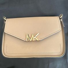 Reposhing This Item I Purchased From @Jamieredmond639. Questions? Leave A Comment Below Michael Kors Beige Crossbody Shoulder Bag, Michael Kors Beige Evening Bag, Michael Kors Beige Shoulder Bag For Formal Occasions, Ar Accessories, Bags Michael Kors, Michael Kors Crossbody Bag, Cell Phone Holster, Phone Holster, Michael Kors Crossbody