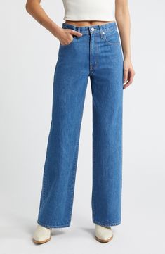 Crafted from Italian stretch denim in Los Angeles, these casual-cool jeans feature a superhigh waist and full-length wide legs for a contemporary look. 32" inseam; 21" leg opening; 12" front rise; 15" back rise (size 29) Zip fly with button closure Five-pocket style 100% cotton Machine wash, tumble dry Made in the USA of imported fabric Trendy Straight Fit Full Length Jeans, Modern Relaxed Fit Flare Jeans In Rigid Denim, Modern Flare Jeans In Relaxed Fit Rigid Denim, Modern Flare Jeans In Rigid Denim With Relaxed Fit, Modern Relaxed Fit Flare Jeans, Modern Flare Jeans With Straight Hem, High Rise Relaxed Fit Flare Jeans In Rigid Denim, High Rise Relaxed Fit Flare Jeans, Modern High Rise Jeans For Spring