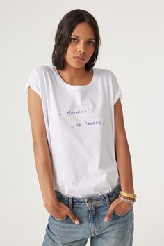 "The fruit of an exclusive collaboration between ba&sh and the multi-talented artist Thomas Lélu, this IRVING T-shirt adds a touch of candid and authentic style to your summer wardrobe. It is made of organic cotton with short sleeves, a round scoop neckline, and a comfortable loose fit. We love the hilarious message in front, scrawled by the artist with his beloved ballpoint pen: ""Morning! No thanks!"" Show off your personality by pairing this fun T-shirt with some shorts or a skirt - Short-sle Dress Mules, Message T Shirts, No Thanks, Skirt And Sneakers, Pump Dress, The Fruit, Jeans Jumpsuit, Cardigan Coat, Ballpoint Pen