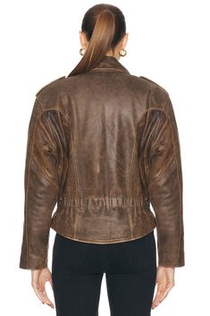 Self: 100% sheep leather, Lining: 100% polyester.  Made in India.  Professional leather cleaning only.  Exposed front zipper closure.  Belt buckle at waist.  Zipper closure at cuffs.  Genuine leather.  .  .  .  .  .  .  .  .  . Rugged Leather Jacket With Zipper Closure, Classic Leather Jacket With Belt Loops, Retro Leather Outerwear With Zipper Closure, Rugged Long Sleeve Biker Jacket, Vintage Leather Outerwear With Zipper Closure, Fall Leather Biker Jacket With Belt Loops, Retro Winter Biker Jacket With Zipper Closure, Retro Leather Biker Jacket With Zipper Closure, Vintage Biker Jacket With Zip Fly For Fall