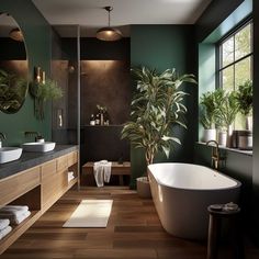 a bathroom with green walls and wood flooring is pictured in this image, there are two sinks on the far side of the bathtub