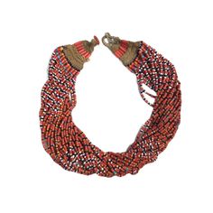 Step into the world of authentic tribal adornments with our Konyak tribe 33-strand necklace. Crafted with care, it boasts a vibrant array of multi-colored beads woven into its ends. Secured with button closures, it exudes cultural charm and authenticity. Despite its age, this necklace remains in very good condition, showcasing a delightful level of wear and patina. same collier has also been mentioned in the book "Ethnic jewelry from Africa , Asia and pacific island page no 164"  REFERENCES Barbier, J. P., Art of Nagaland: The Barbier-Müller Collection, Geneva, Los Angeles County Museum of Art, 1984. Giehmann, M., Naga Treasures: Tribal Adornment from the Nagas - India and Myanmar, 2001. Jacobs, J., The Nagas: Hill Peoples of Northeast India, Thames & Hudson, 1990. Saul, J.D., The Naga of Colorful Traditional Beaded Necklaces For Ceremonies, Traditional Colorful Beaded Necklaces For Ceremonies, Artisan Beaded Necklaces For Traditional Ceremonies, Artisan Multicolor Necklaces For Traditional Ceremonies, Multicolor Artisan Necklace For Traditional Ceremonies, Artisan Multicolor Necklace For Traditional Ceremonies, Bohemian Multicolor Beaded Necklaces For Traditional Ceremonies, Red Bohemian Necklaces For Traditional Ceremonies, Bohemian Red Necklaces For Traditional Ceremonies