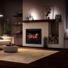 a living room with a fire place in the center and shelves on the wall next to it