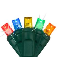 an assortment of colored lights on top of a green object with the words soft twinkle