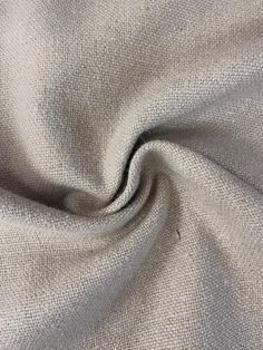 a close up view of the fabric on a white background with grey and black stripes