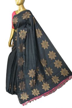 Come up with a different style with our new muga banarasi saree with a fantastic floral motif design on the body and golden zari work all over the saree, making this saree a distinguished piece in a lovely shade of coal black color. Color: A shade of coal black color Technique: Comes with allover zari work with floral pattern work on the body Fabric: Muga Silk Quality: Indyvogue's Assurance of Pure Silk Mark Certified Saree Tussar Silk Fabric With Cutdana Embroidery, Pre-draped Katan Silk Saree With Motifs, Designer Tussar Silk Saree With Motifs, Cotton Silk Embroidered Saree Fabric With Pallu, Designer Wear Tussar Silk Saree With Motifs, Embroidered Cotton Silk Saree With Pallu, Embroidered Cotton Silk Saree Fabric With Pallu, Cotton Silk Embroidered Saree For Festivals, Festival Cotton Silk Saree Embroidered Fabric