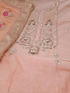 Item Overview ATHARVA Hand Embroidered Salwar Kameez/ Beautiful Embroidered Neck Peach w/Elegant Meenakari Banarsi Silk Dupatta/Bridal Trousseau- Dno. CH1622 Fabric: * Shirt Chanderi Silk 2.5 Mts, * Dupatta: Banarsi Silk Dupatta- Meenakari work- Latkans Tassels * Bottom Santoon 2.5 Mts. Excusive Hand Embroidered Party Wear Punjabi Suit. Customization: * Fabrics: Designs Can be made in different Fabrics. * Stitching Available Care: *Dry Clean/ Avoid direct Ironing on Embroidery Part. *Lining is r Peach Traditional Wear In Raw Silk With Resham Embroidery, Peach Resham Embroidered Raw Silk Traditional Wear, Peach Raw Silk Traditional Wear With Resham Embroidery, Pink Lawn Suit With Resham Embroidery For Wedding, Elegant Pink Lawn Suit For Navratri, Peach Wedding Sets With Resham Embroidery, Unstitched Peach Sets With Zari Work, Peach Resham Embroidery Sharara For Wedding, Peach Sharara With Resham Embroidery For Wedding