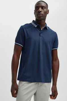 Model Height: 6'2 - Wearing Large Big & Tall: Height 6'3- Wearing XXXL Available In Black, White, Grey, Pink, Red, Navy, Neon Pink, Neon Yellow, Green, Yellow, Light Blue, and Coral Fold Down Collar 3 Button Closure Short Sleeve 100% Cotton Imported | Mens Wilson Short Sleeve Polo in Navy Blue size Small by Fashion Nova Tall Height, Pink Neon, Navy Fashion, Beauty Clothes, Yellow Light, Short Sleeve Polo, Neon Yellow, Model Height, Neon Pink