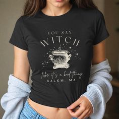 Get ready to be OBSESSED with your new witch baby tee! It's the cutest and most trendy way to emit all those witchy vibes! Great as a gift! * S I Z I N G * ✺ Shirt is a Gildan5000B youth size ✺ Fits like a traditional 90's style baby tee ✺ Check size guide graphic for fit * S H I P P I N G * T I M E S * ✺ Our items are individually made with love for each of our buyers. Because of this, our processing time is 2-5 business days (depending on order volume) plus transit time, but typically much faster. We know our customers want their items as quickly as possible! * K E E P * S H O P P I N G *   ✺ Shop our entire collection here:  https://www.etsy.com/shop/MoonGoddessApparel EXCHANGES: Because all of our items are custom and made to order, our policy is exchange only. In the event that you'd Fitted Gothic T-shirt For Fall, Fitted Witchy Top For Halloween, Goblincore Crew Neck T-shirt For Fall, Black Goblincore Top With Graphic Print, Fitted Halloween Tops With Letter Print, Spooky Black Cotton Top, Fitted Grunge Halloween T-shirt, Fitted Halloween Top With Letter Print, Spooky Fitted Graphic Print Tops