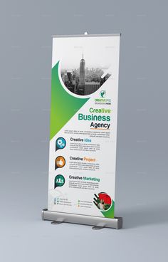 a roll up banner is shown with an image of a cityscape in the background