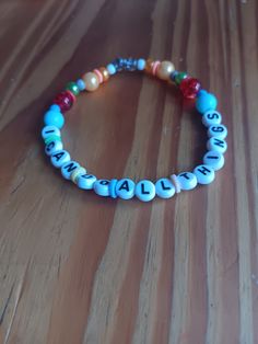 A bracelet with a beautiful Bible verse Adjustable Inspirational Beaded Bracelets, Multicolor Inspirational Jewelry For Friendship, Inspirational Multicolor Bracelet Jewelry, Inspirational Multicolor Bracelet, Inspirational Multicolor Friendship Jewelry, Inspirational Multicolor Beaded Jewelry, Everyday Inspirational Multicolor Jewelry, Casual Letter Bead Bangle Bracelets, Casual Bangle Bracelet With Letter Beads