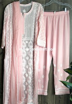 4 pc Full set of Chikankari Kurti,Liner, Pants and Dupatta.. Beautifully embroidered georgette kurta and palazzo . Chiffon Dupatta and Cotton Liner included . Kurta Length-48 inches Palazzo Length -38 inches  Dupatta- One Size Pink Chikankari Embroidery Pant Set For Wedding, Pink Chikankari Embroidered Wedding Pant Set, Pink Chikankari Embroidered Pant Set For Wedding, Pink Bollywood Pant Set With Chikankari Embroidery, Unstitched Pink Pant Set With Chikankari Embroidery, Pink Anarkali Pant Set For Festivals, Pink Straight Kurta Sets With Chikankari Embroidery, Pink Chikankari Embroidery Sets For Navratri, Pink Semi-stitched Pant Set For Diwali