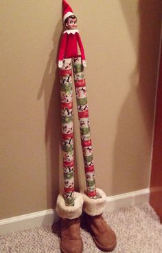 there is a elf standing next to the wall with his legs wrapped in leggings