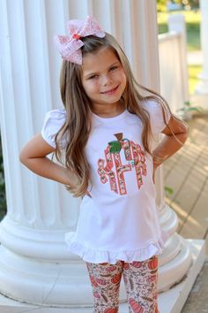 This shirt is sewn with our beautiful custom pumpkin vines fabric in monogram letters of your choice. Add the matching items below: Matching leggings and bows Fall Monograms, Pumpkin Vine, Monogram Shirt, Monogram Shirts, Matching Leggings, Ruffle Shirt, Shirt Long Sleeve, Girl Falling, Fall Shirts