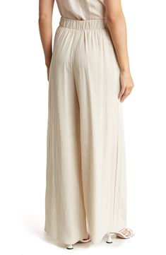 A stretchy waistband brings all-day comfort to linen-blend pants with a breezy wide-leg silhouette. Elastic waist Pulls on 50% linen, 50% rayon  Machine wash, line dry  Imported Chic Relaxed Fit Flax Bottoms, Relaxed Full-length Bottoms With Elastic Waistband, Versatile Stretch Wide Leg Pants For Vacation, Versatile Rayon Bottoms For Vacation, Vacation Rayon Ankle-length Pants, Stretch Rayon Bottoms For The Beach, Stretch Rayon Bottoms For Beach, Stretch Rayon Beach Bottoms, Versatile Linen Bottoms