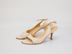 Step out in style with these Leather Slingback Sandals in Cream Color by Marks & Spencer. Featuring an open toe and high kitten heel, these sandals combine elegance with comfort. The cream leather construction offers a versatile and chic look, perfect for both day and night wear. The adjustable slingback strap ensures a secure fit, making them ideal for any occasion. Whether you're dressing up for a special event or adding a touch of sophistication to your everyday outfit, these sandals are a mu Classic Open Toe Slingback Sandals For Spring, Cream Slingback Sandals For Summer Formal, Cream Slingback Sandals For Formal Summer Events, Classic Beige Low Heel Sandals, Beige Open Toe Slingback Sandals For Formal Occasions, Cream Slingback Sandals For Spring Formal Events, Cream Slingback Sandals For Formal Spring Occasions, Classic High Heel Slingback Sandals For Summer, Classic Open Heel Slingback Sandals For Spring