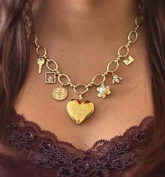 This gold plated necklace features a heart locket with six beautiful charms surrounding it. This piece has a toggle clasp, making it easy to put on. Locket Charms, Charm Necklaces, Heart Locket, Gold Plated Necklace, Toggle Clasp, A Heart, Locket, Charm Necklace, Necklace Etsy