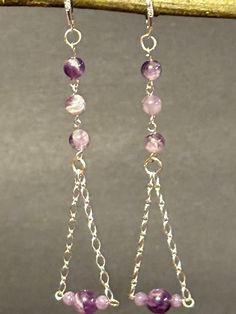 These are one of a kind beautifully handcrafted Dog tooth amethyst Geometric Dangle earrings. They hang from sterling silver chain, and close with lever back earring wires. Wire Chandelier Earrings, Wire Chandelier, Lavender Amethyst, Jewelry Making Earrings, Geometric Chandelier, Earring Wires, Making Earrings, Dog Teeth, Handmade Wire Jewelry