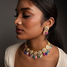 Inspired by the pastel colors of spring, our Kanali Jewelry Set will bring a lovely array of colors to your look. Featuring unique stones, and Kundan on Gold-Plating this dainty set is the perfect add to your collection. Specifications Materials used: kundan, Stones, Gold-Plating At Romikas, we pride ourselves on the craftsmanship and high quality of our jewelry, designed to enhance your natural beauty. Please contact us with any questions. Elegant Multicolor Kundan Necklace, Festive Fusion Kundan Necklace With Multi-stone, Festive Fusion Multi-stone Kundan Necklace, Traditional Multicolor Kundan Necklace With Stones, Festive Multicolor Jewelry With Stones, Multicolor Jeweled Kundan Necklace In Fusion Style, Multicolor Jeweled Kundan Fusion Necklace, Multicolor Multi-stone Kundan Necklace For Wedding, Kundan Multi-stone Necklace For Celebration