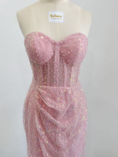 This fairytale yet stylish homecoming dress will make you stand out at your homecoming parties. the pink sequin tulle is decorated with pearls all over the dress, showing off a luxurious and airly dream look. 

Sequin Tulle

Sweetheart

Bones

Sheath

With Padding Sparkling Fitted Tulle Evening Dress, Pink Sequin Dress For Prom Season And Night Out, Glamorous Glitter Tulle Evening Dress With Sweetheart Neckline, Glamorous Evening Dress With Sweetheart Neckline In Glitter Tulle, Pink Embellished Sequin Dress For Prom Season, Fitted Tulle Sequin Dress For Prom Season, Pink Sequin Dress For Prom, Pink Sweetheart Neckline Evening Dress For Prom, Fitted Sequin Tulle Evening Dress