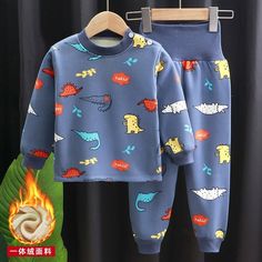 Our Cartoon Long Sleeve Pajama Sets is the perfect addition to your child's sleepwear collection this autumn season! Featuring a cute and playful cartoon design, these pajama sets are sure to make your child smile and feel cozy and comfortable.Made from high-quality materials, these pajama sets are thick, soft, and warm, making them perfect for colder autumn nights. The long sleeve T-shirt tops provide ample coverage and warmth, while the matching pants ensure maximum comfort and ease of movemen Tops With Pants, Child Smile, Autumn Season, Cotton Set, Pajama Sets, Long Sleeve Pyjamas, Cute Tshirts, Shirt And Pants, Cartoon Design