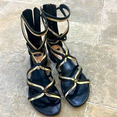 Elisabetta Franchi Made In Italy- Black And Gold Gladiator Sandals Gold Gladiator Sandals, Pink Crocs, Brown Leather Flats, Wooden Sandals, Handmade Sandals, Studded Flats, Leather Thong Sandals, Footbed Sandals, Brown Leather Sandals