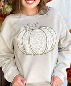 There is so much to love about the fall, this Leopard Pumpkin Shirt is just one of them! This beautiful light leopard pumpkin design is available on your choice of shirt color and style. Choose from short sleeve, long sleeve, or sweatshirt to meet your needs. This pumpkin shirt is perfect for layering under a cardigan or pairing with leggings! This festive pumpkin tee shirt is perfect for dressing up or down depending on the festivities! 
Born To Be Sassy offers a wide selection of fall clo Casual Leopard Print T-shirt For Fall, Trendy Comfortable Fit T-shirt For Fall, Trendy Comfort Fit T-shirt For Fall, Oversized Long Sleeve T-shirt For Fall, White Long Sleeve T-shirt For Fall, Fall Long Sleeve Relaxed Fit T-shirt, White Fall Sweatshirt, Comfortable Fit T-shirt For Fall, Leopard Print Relaxed Fit Top For Fall