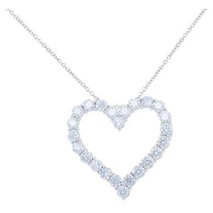 18K White Gold Large Size Open Heart Diamond Pendant Features 6.00 carats of diamonds, ideal cut brilliant cut diamonds. 24 stones in total each diamond approx 0.25 carats. Brilliant Cut White Diamond Open Heart Necklace, Formal Heart Cut Cubic Zirconia Diamond Necklace, Luxury Heart Shaped Brilliant Cut Diamond Necklace, Luxury Heart Cut Brilliant Diamond Necklace, Luxury Heart Cut Diamond Necklace With Brilliant Cut, Formal Heart Cut Diamond Necklace, Luxury Diamond White Heart Cut Diamond Necklace, Brilliant Cut Heart Shaped Diamond Necklace For Formal Occasions, Brilliant Cut Diamond Heart Necklace For Formal Occasions