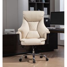 an office chair sitting on top of a hard wood floor