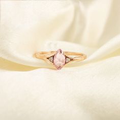 This ring with beautiful Natural sapphire, is set in 18K Solid Gold. It is a ring perfect for any gifting occasions for your loved ones. Purchase the perfect gift for your mom, wife, daughter, girlfriend, and fiancee.  -Material - 18K Solid Rose Gold -Gemstone - Natural Pink Sapphire Diamond  -Gemstone weight - 0.530  Ct  - Diamond Weight - 0.020 Ct -Gross weight - 2.13 grams In ancient times, it was thought that a pink sapphire would bring you honesty, loyalty, luck and, most importantly, love. In Asia, their hue is loved for its resemblance to the lotus flower. Today, pink sapphires are said to symbolise beauty, wisdom, purity and love, and we think it's time to celebrate them. You can also go to my shop Home for more:  https://www.etsy.com/shop/TheJewelVine We offer free resizing, and a Rose Gold Solitaire Stackable Rings Gift, Rose Gold Topaz Gemstone Ring As Gift, Rose Gold 14k Birthstone Ring With Accent Stones, Rose Gold Crystal Ring With Birthstone, Elegant Pink Gold Birthstone Promise Ring, Rose Gold Gemstone Stackable Promise Rings, Fine Jewelry Rose Gold Topaz Ring Gift, Fine Jewelry Rose Gold Topaz Ring, Rose Gold Diamond Birthstone Ring Gift