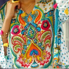 Gorgeous And Colorful All Cotton Long Sleeve Tunic Adorned With Colorful Tassels! Bohemian Embroidered Long Sleeve Fabric, Bohemian Embroidered Fabric For Spring, Bohemian Floral Embroidered Fabric For Summer, Bohemian Floral Embroidered Fabric For Spring, Summer Festival Floral Embroidered Fabric, Festive Bohemian White Embroidered Fabric, Embellished Multicolor Embroidered Fabric For Festivals, Bohemian Multicolor Embroidered Fabric For Spring, Spring Bohemian Multicolor Embroidered Fabric