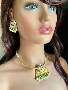 Simply Splendid - Another beautifully crafted gold plated Jadau kundan & Pachi kundan hasli with cluster pearls gold & antique gold finish. Adjustable via dori. Brass is used as base metal. Subtle,  trendy necklace set to gleam your festive appearance. Comes with matching stud style earrings. Style this with any Ethnic or Indo Western Attire. ✅Shop our collection here: https://www.etsy.com/shop/KKsCulture We want you to LOVE your new jewelry!  CARE TIP  1. Keep away from moisture and perfume 2. Store in cotton or zip lock bags or air tight boxes. 3. Spot cleaning only. 4. Jewellery is the last thing you should wear and the first thing you should remove. 💕Send us an email if you need help! ✅ Contact Us: +1 (732) 325-2222 Gold Plated Meenakari Temple Necklace Chandbali, Gold Plated Kundan Necklace With Latkans For Temple Jewelry, Gold Plated Meenakari Temple Necklace In Chandbali Shape, Gold Plated Meenakari Temple Necklace In Chandbali Style, Gold Plated Kundan Necklace With Latkans In Temple Style, Yellow Gold Kundan Necklace With Meenakari For Puja, Diwali Meenakari Temple Necklace Gold Plated, Gold Plated Kundan Necklace For Puja, Festive Gold Plated Temple Necklace With Meenakari