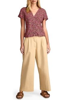 A dainty floral print adds feminine charm to this blouse from Lucky Brand. | Lucky Brand Women's Short Sleeve V-Neck Ditsy Floral Blouse, Large Floral Print V-neck Tops For Work, Floral Print V-neck Blouse For Daywear, Daywear V-neck Blouse With Floral Print, Fall Ditsy Floral Print V-neck Blouse, Ditsy Floral Print V-neck Blouse For Fall, Fall V-neck Blouse With Ditsy Floral Print, V-neck Ditsy Floral Print Blouse For Fall, Spring Ditsy Floral Print V-neck Tops, Fall Ditsy Floral Print V-neck Top