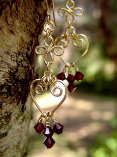 Handmade 14k Gold Filled Chandelier Earrings Genuine Red Garnet Swarovski Crystal Chandelier Earrings. Large enough to be noticed, light enough to wear every day! These Garnet Chandelier Earrings are a just 2 Inches long. Every single little gemstone is wire- wrapped one at a time, each pair of earrings take 2 hours to make! We do not just use "pre-made" parts and attach our gemstones, we wire wrap each bead individually and attach them to our custom wire form shapes. We do not import, or mass-p Recovery Jewelry, Dramatic Earrings, Gold Chandelier Earrings, Bijoux Fil Aluminium, Crystal Chandelier Earrings, Handmade Earrings Beaded, Diy Wire Jewelry, Long Dangle Earrings, Holiday Earring