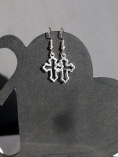 ♥ 10% off when you buy two pairs of earrings. Use code 10OFFTWO at checkout. ♥ Lovely, simple and delicate Silver Cross Earrings, Holy Cross Antique Silver Earrings. Hollow Cross is 1.5 cm (15 mm) wide by 1.8 cm (1.8 mm) length.  The Ear Hooks are silver plated. Crosses are silver toned. Ear Studs and Clip On's in silver tone only.  Please see photo for details.  Thank you for looking! Pierced Drop Cartilage Earrings Gift, Drop Earrings Cartilage Pierced As Gift, Nickel-free Drop Cartilage Earrings As Gift, Silver Drop Cartilage Earrings As Gift, Teardrop Metal Cartilage Earrings For Gift, Nickel Free Adjustable Cross Earrings, Nickel-free Cross Hoop Earrings As Gift, Nickel-free Cross Earrings As Gift, Nickel-free Cross Earrings For Gift