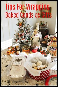 a christmas tree sitting on top of a kitchen counter next to baked goods as gifts