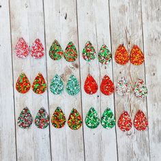 "These teardrop resin earrings are made with lots of glitter for lots of sparkle! Options in this listing: -Christmas mix 1- a mix of various sizes of red and white glitter -Christmas mix 2-  red and green glitters with hints of white -Christmas mix 3- red, white, and green confetti dots -Christmas mix 4- red and gold glitters -Christmas mix 5- red and gold glitters with green christmas trees -Christmas mix 6- a mix of various sizes of green and white glitter -Christmas mix 7- red, gold, and sil Glitter Crafts Adults, Epoxy Christmas, Crafts Adults, Green Confetti, Green Christmas Trees, Gold Glitter Christmas, Christmas Resin, Latest Obsession, Christmas Mix