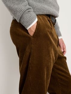 The cool-weather version of our best-selling pleated chino. You'll love how the rugged corduroy feels easy + casual. Single pleat for a little extra movement throughout the leg. Finishing details: real Corozo buttons and our signature "X" belt loop in the back For anyone 5’9" and under, we suggest ordering the regular inseam. For anyone taller than 5'9", we suggest ordering the long inseam. Fits true to size. Size 32 measures 34.5" around the waist and 44.5" around the hip. Leg opening measures Pleated Pant, Corduroy Pant, Straight Leg Pant, Mens Chinos, Pleated Pants, Fall Collections, Corduroy Pants, Straight Leg Pants, Straight Leg